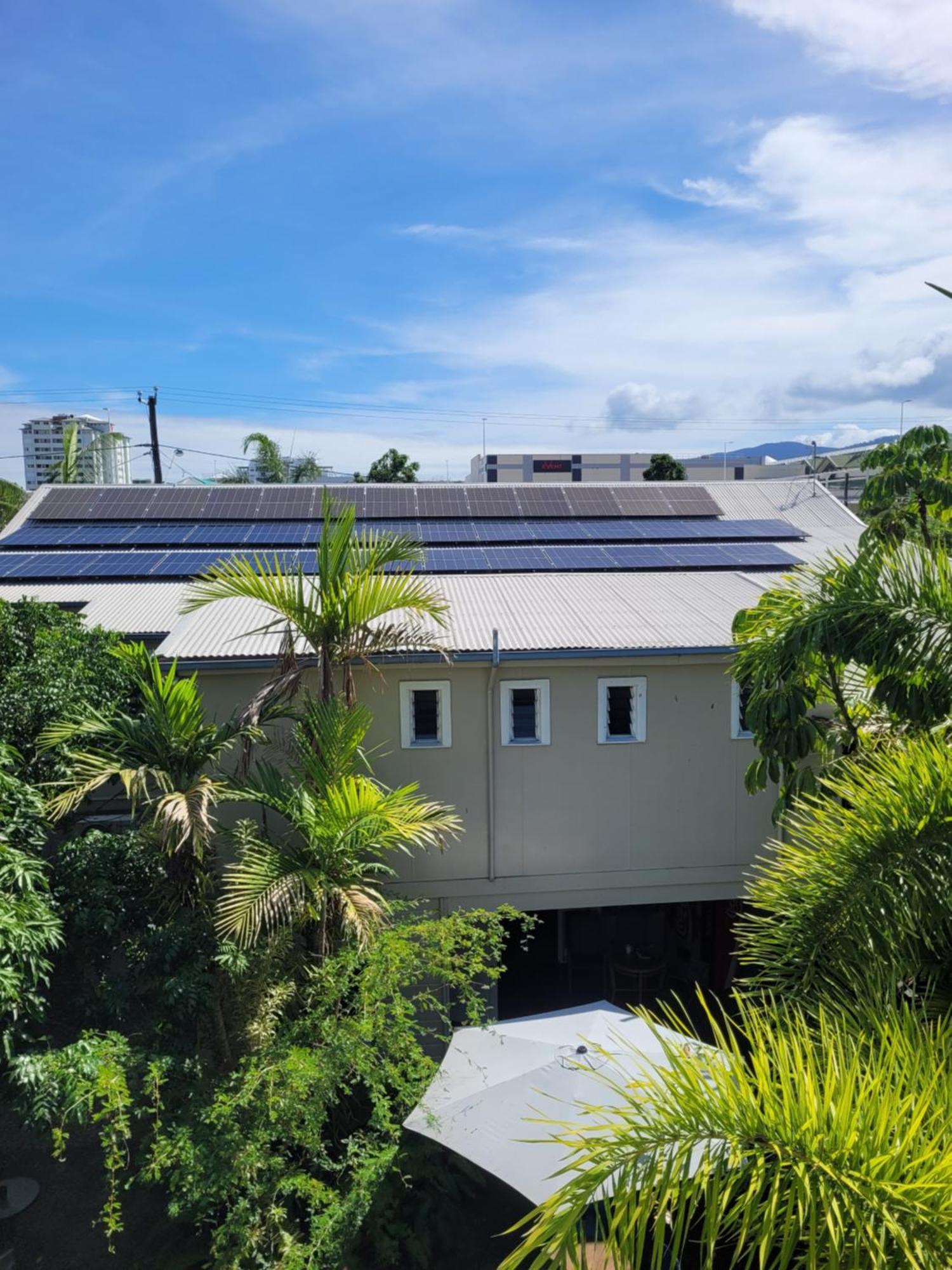 Travellers Paradise Cairns Eksteriør bilde Solar panels on a home in Cairns, Queensland, Australia